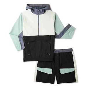 Conjuntos cortavientos de bloque de colores con múltiples bolsillos y rayas reflectantes de poliéster 100% de alta calidad con logotipo personalizado para hombre HIGH STREET - Product Image 1