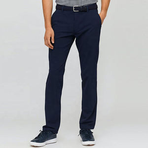 ... Pantalones de golf de corte clásico para hombres con material suave elástico de rendimiento y diseño liviano para uso comercial e informal - Product Image 1