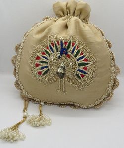 Design Zari Embroidery on Raw Silk Potli Bags <b>Embellished</b> with Crystal Glass Beads Pearls Work for Party Wear Wedding 2025 - Product Image 1