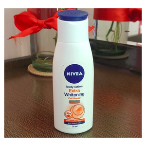 Loción Corporal Aclarante Avanzada, Hidratación Profunda, Loción Corporal Reparadora Celular Extra Blanqueadora Nivea con Doble Protección Solar - Product Image 1