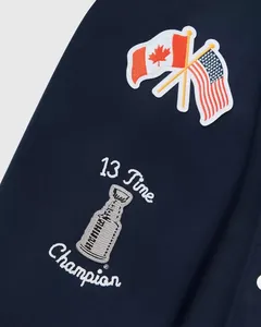 แจ็คเก็ตวาร์ซิตี้แบบกระดุมแป๊กสีน้ำเงิน OVO ของทีม Toronto Leafs สำหรับผู้ชาย แบบสั่งทำพิเศษ - Product Image 3