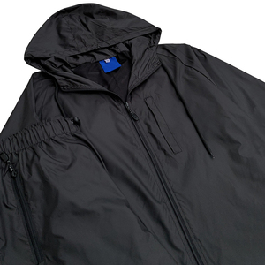 Logo personnalisé Survêtements d'extérieur coupe-vent et respirants Survêtement coupe-vent en polyester et nylon léger pour homme - Product Image 6