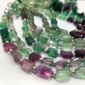 Cuentas de Briolette facetadas de 8 a 12mm de varios colores de fluorita natural vendidas por hebra de 8 pulgadas de largo - Product Image 1