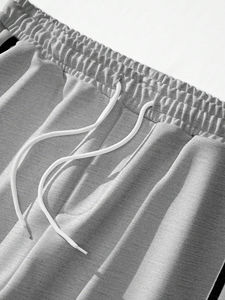 Wholesale <b>Men</b> <b>Jogger</b> Sporsity <b>Loose</b> <b>Fit</b> <b>Men's</b> Sweatpants With Contrast Piping, Button Side and Drawstring Waist Sweatpants <b>Men</b> - Product Image 6