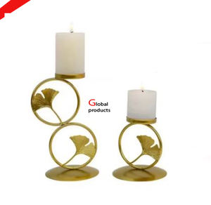 prime quality <b>golden</b> finished gingko leaf design candle stand for hotel restaurant and <b>bar</b> - Product Image 1