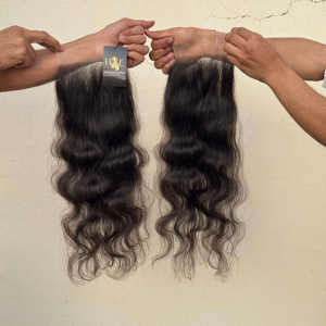 Cheveux bruts cambodgiens bruts de qualité supérieure 11A prix d'usine paquets de cheveux humains indiens bruts bouclés ondulés et fermeture frontale en dentelle HD 13x6 - Product Image 1