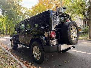 Clean 2014 Jeep Wrangler Unlimited Sahara Dirección Izquierda 4WD - Product Image 3