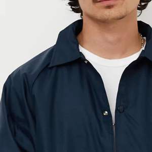 แจ็คเก็ตบอมเบอร์ผ้าฝ้าย 100% คุณภาพสูง ป้องกันลมและน้ำ ทรงหลวม ใส่ได้ทั้งชายและหญิง รับผลิตแบบ OEM พร้อมสกรีนโลโก้ตามสั่ง - Product Image 4