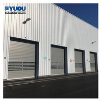 Puerta Industrial Enrollable de Alta Velocidad con Lamas de Aluminio de 40 mm de Espesor y Cubierta de Acero Inoxidable o Acero