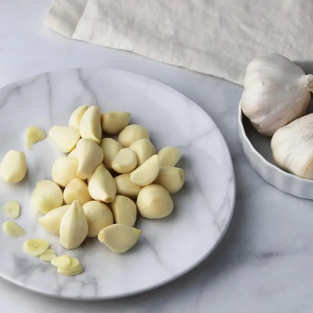 Ajo saludable en bolsa de malla de 5 KG para la venta/Cosecha fresca Ajo púrpura Embalaje Verduras Bolsas de malla