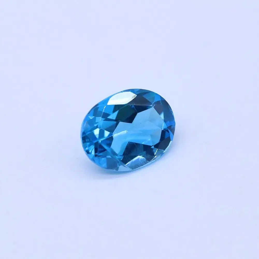 Topacio azul suizo de calidad fina 3X5mm a 12X16mm Forma ovalada Piedra preciosa calentada facetada suelta de proveedor de piedra india para joyería