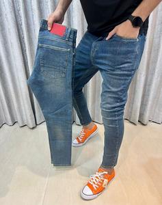 Pantalon en jean léger déchiré en toile de coton avec fermeture éclair super confortable Blue Wash pour hommes Fabriqué au Bangladesh - Product Image 1