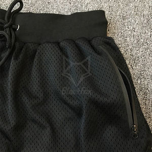 Pantalones cortos de baloncesto deportivos para hombre al por mayor con bolsillos y cremallera de malla de poliéster sólido con logotipo personalizado - Product Image 6