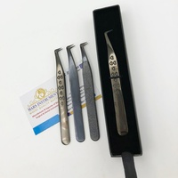Pince à cils en acier inoxydable de style botte à 90 degrés avec pointe en fibre pointue Plasma noir pour des extensions de cils durables