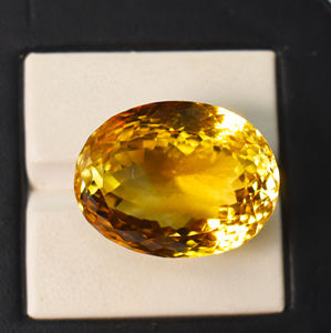 Citrine naturelle dorée ovale facettée couleur or 24X19X16 mm 52,94 carats - Product Image 1