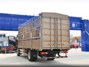 Camion utilitaire à ridelles 4x2 d'occasion, 10-15 tonnes, pour transport d'animaux, diesel, bon état, conduite à gauche - Product Image 4