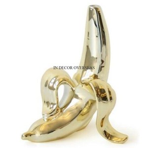 Banane en métal de qualité supérieure plaquée or et polie brillante et argentée de qualité supérieure Sculpture décorative de table à manger pour maison et hôtel - Product Image 1