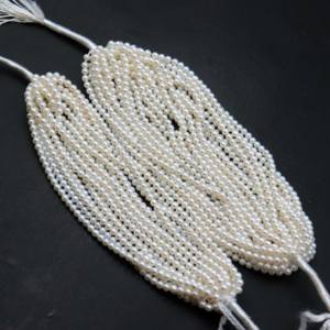 Meilleures ventes Perles d'eau douce naturelles minuscules Perles rondes lisses de haute qualité Perles blanches de haute qualité 3-3,5 mm Perles 5 pouces - Product Image 1