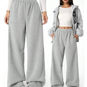 Pantalones de chándal holgados de algodón liso para mujer con bolsillos estilo informal de gran tamaño - Product Image 1