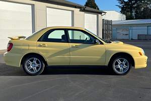 Subaru Impreza WRX Sedán 2002 Usado, Sin Reserva, Transmisión Manual de 5 Velocidades, Tracción en las Cuatro Ruedas, Color Amarillo Blaze Raro, Mayormente sin Modificaciones, Propiedad de Washington - Product Image 3