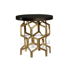 Table centrale décorative pour la maison en métal cadre couleur or avec dessus de forme ronde de couleur noire Tables d'appoint de lit faites à la main - Product Image 1