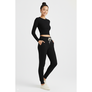 Pantalon de survêtement d'hiver en tricot côtelé tendance, taille mi-haute élastique, devant plat, coupe ample, pantalon pour femme, couleur personnalisée, fabricant en gros - Product Image 1