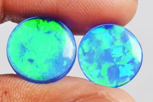 พลอยโอปอลธรรมชาติผ่านการอบความร้อนสำหรับทำเครื่องประดับ คุณภาพสูง สีน้ำเงินอมเขียว ทรงคาโบชอง ขนาด 11x11x2 มม. แบบสังเคราะห์ ทรงกลม - Product Image 4