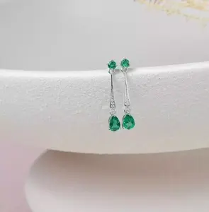 Boucles d'oreilles goutte/balancent en tanzanite simulée taille poire 2.20Ct plaqué or blanc 14 carats bijoux en moissanite - Product Image 1