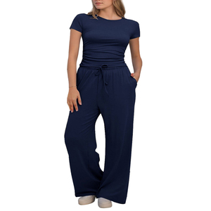 Conjunto de camiseta y pantalón acampanado de chándal para mujer más vendido, nuevo diseño personalizado, Material transpirable de alta calidad, patrón sólido - Product Image 1