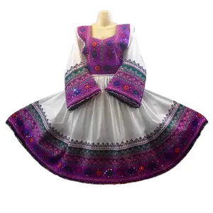 AFGHANI WOMEN KUCHI FROCK FEATURES HUGE MIRROR DETAILS THAT HELPS IT SHOWCASE THE AFGHANI HERITAGE PERFECTLY BY AA IMPEX