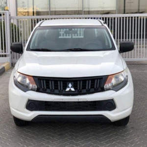 Mitsubishi L200 2024 USADO, Tracción en las Cuatro Ruedas, Asientos de Cuero, Control de Crucero Adaptativo, Volante a la Izquierda, Cámara Trasera de 360°, Neumáticos R18, Automático, 5 Plazas, Luces LED, 4.5L - Product Image 1