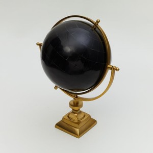 Table Accent with Stand is shown It is a decorative item featuring a black <b>globe</b> with golden accents and a stand - Product Image 2