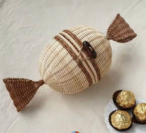 Les jouets en forme de bonbon en rotin naturel sont des jouets pour les jeunes enfants - Product Image 1