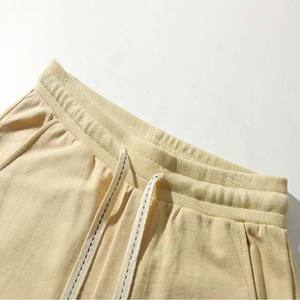 กางเกงขาสั้นเสื้อผ้าผู้ชายแบบเชือกรูดน้ำหนักมากสำหรับฤดูร้อนกางเกงวิ่งจ๊อกกิ้งทรงหลวมกางเกงขาสั้นผ้าฝ้าย100% ออกแบบได้ตามต้องการมีกระเป๋า - Product Image 2