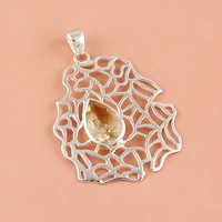 Pendentif en pierre précieuse de tanzanite naturelle en argent sterling 925 fait à la main Style religieux or fin exporté fabricant de pierres précieuses en argent