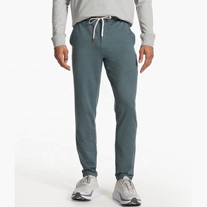 Pantalon de jogging pour homme en polyester et élasthanne, coupe slim, avec poche latérale, taille élastique respirante et personnalisable - Product Image 1