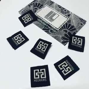 Etiquetas tejidas personalizadas para ropa Etiquetas de marca de alta calidad, etiquetas de ropa de tela, opciones de costura o planchado - Product Image 3