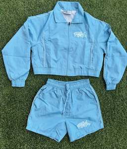 Conjunto de pantalones cortos cortavientos personalizados de verano para hombre, conjunto de pantalones cortos cortavientos de dos piezas de poliéster 100%, ropa para correr de Color dividido - Product Image 1