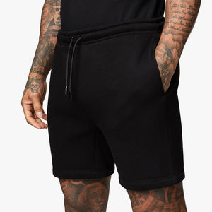 กางเกงขาสั้นลำลองสีดำสำหรับผู้ชาย ระบายอากาศได้ดี เหมาะสำหรับฤดูร้อน สไตล์สตรีทแวร์ มีเชือกผูก ลายเรียบ - Product Image 1