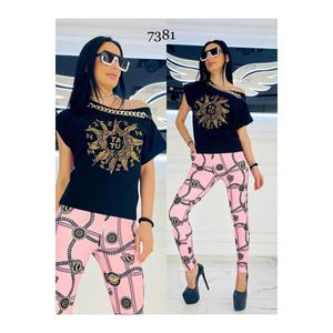 Completo tuta in pietra di cristallo con spalle scoperte con motivo sole-rosa - Product Image 1