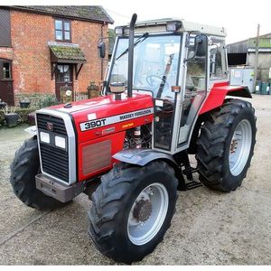Tracteur agricole d'occasion Massey Ferguson 385 avec cabine Tracteurs MF 4x4 Chargeur frontal et pelleteuse - Product Image 2