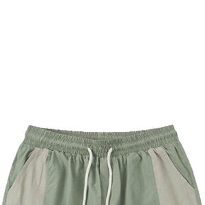 Pantalones cortos informales de calidad con logotipo personalizado, tela elástica para máxima movilidad, patrón bordado llamativo, tipo sólido - Product Image 5