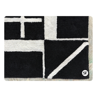 Tapis en coton touffeté noir et blanc fabriqué à la main doux texturé élégant décor à la maison tapis pour salon chambre utilisation au sol