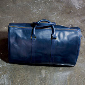 Sac de voyage en cuir véritable avec poignées robustes et bandoulière réglable, idéal pour un usage quotidien ou des voyages - Product Image 4