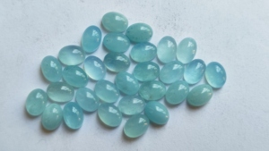 Haute qualité laiteux aigue-marine bleu naturel semi-précieux ovale coupe 6X8mm dos plat Cabochon fabrication de bijoux pierres en gros - Product Image 6