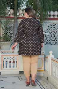 Plus size <b>black</b> floral printed rayon short kurti for women with round neck and <b>bell</b> <b>sleeves</b> designed in soft comfortable fabric - Product Image 4