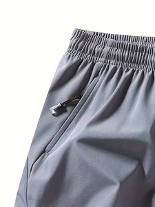 Pantalones cortos de gimnasio para hombre baratos al por mayor, pantalones cortos de entrenamiento físico de malla de playa de secado rápido con bolsillos de talla grande, cintura estampada de poliéster liso - Product Image 4