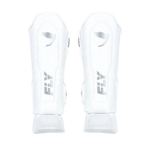 Pro Combat Sports Protège-tibias - Équipement de protection haute performance pour le Muay Thai et le MMA - Conception ergonomique en jaune vif - Product Image 4