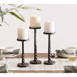 Elegante portavelas de hierro de mesa con una silueta contemporánea elegante y un acabado de metal envejecido industrial para un toque moderno - Product Image 4