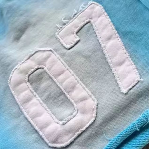 กางเกงขาสั้นผ้าฝ้าย100% สำหรับฤดูร้อนกางเกงขาสั้นผ้าเทอร์รี่แบบหลวมผ้าปักลายแสงแดดแนวสตรีท - Product Image 5